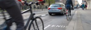 cyclists riding in the bike lane